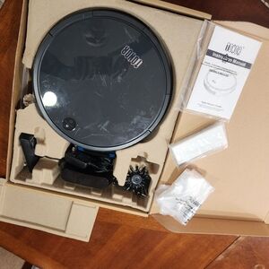 Black TONOR Robot Vacuum Cleaner. Like New.
